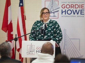 Heather Grondin, vice-president, corporate affairs and external relations, Windsor-Detroit Bridge Authority, announces recipients of the Gordie Howe International Bridge Community Benefits Plan during a press event at the Sandwich Teen Action Group, on Wednesday, Feb. 1, 2023.
