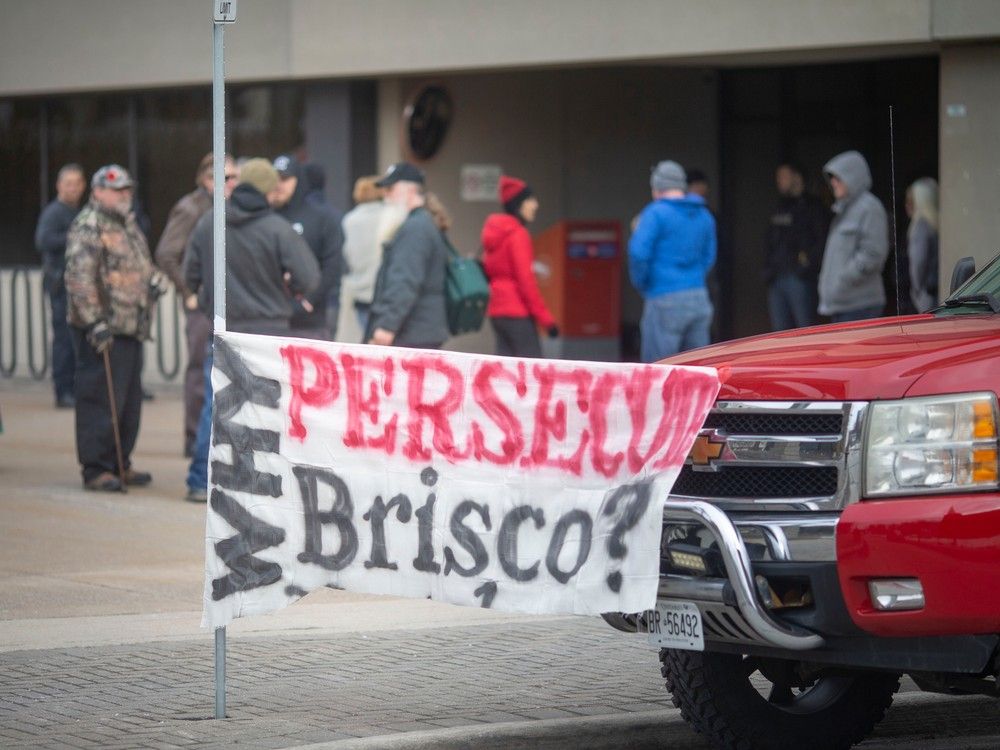 People rally to support Constable Michael Brisco, who is accused of donating to the freedom rally protesters, on Monday, Feb. 6, 2023.