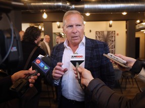 Local businessman Brian Schwab speaks to reporters at the grand opening of the Cucina 360 restaurant in downtown Windsor on Wednesday, February 8, 2023. Schwab is part of the ownership group that owns the building where the restaurant is located.