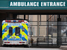 An ambulance sits parked outside Windsor Regional Hospital - Met Campus, on Tuesday, Feb. 7, 2023.
