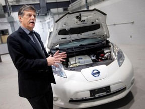 Lido Zuccato, Dean, Schools of Engineering, Apprenticeship & Skilled Trades at St. Clair College, is pictured next to a Nissan Leaf, a battery electric vehicle, as he talks about the college?s new EV technician program, on Thursday, Feb. 15, 2023.