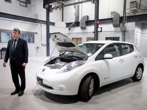 Lido Zuccato, Dean, Schools of Engineering, Apprenticeship & Skilled Trades at St. Clair College, is pictured next to a Nissan Leaf, a battery electric vehicle, as he talks about the college?s new EV technician program, on Thursday, Feb. 15, 2023.