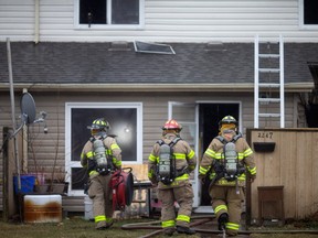 Fire crews work at the scene of a multi-unit residential fire on the 2200 block of Union St., in West Windsor, on Wednesday, Feb. 22, 2023.