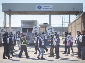 Employees at Highbury Canco in Leamington are seen on the picket line on the first day of striking, on Monday, February 13, 2023.