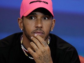 Lewis Hamilton of Great Britain and Mercedes reacts in a press conference during previews ahead of the F1 Grand Prix of Abu Dhabi at Yas Marina Circuit in Abu Dhabi, United Arab Emirates, Nov. 17, 2022.