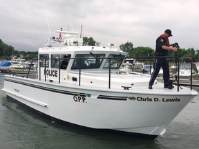 The Ontario Provincial Police introduced their newest marine vessel on Thursday, June 23, 2016, named after retired Commissioner Chris D. Lewis. The new vessel is shown at the Leamington Marina during the event.
