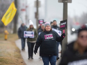 Nurses and supporters take part in a province wide action day, organized by the Ontario Nurses Association, as they rally outside Windsor Regional Hospital - Ouellette Campus on Thursday, Feb. 23, 2023.