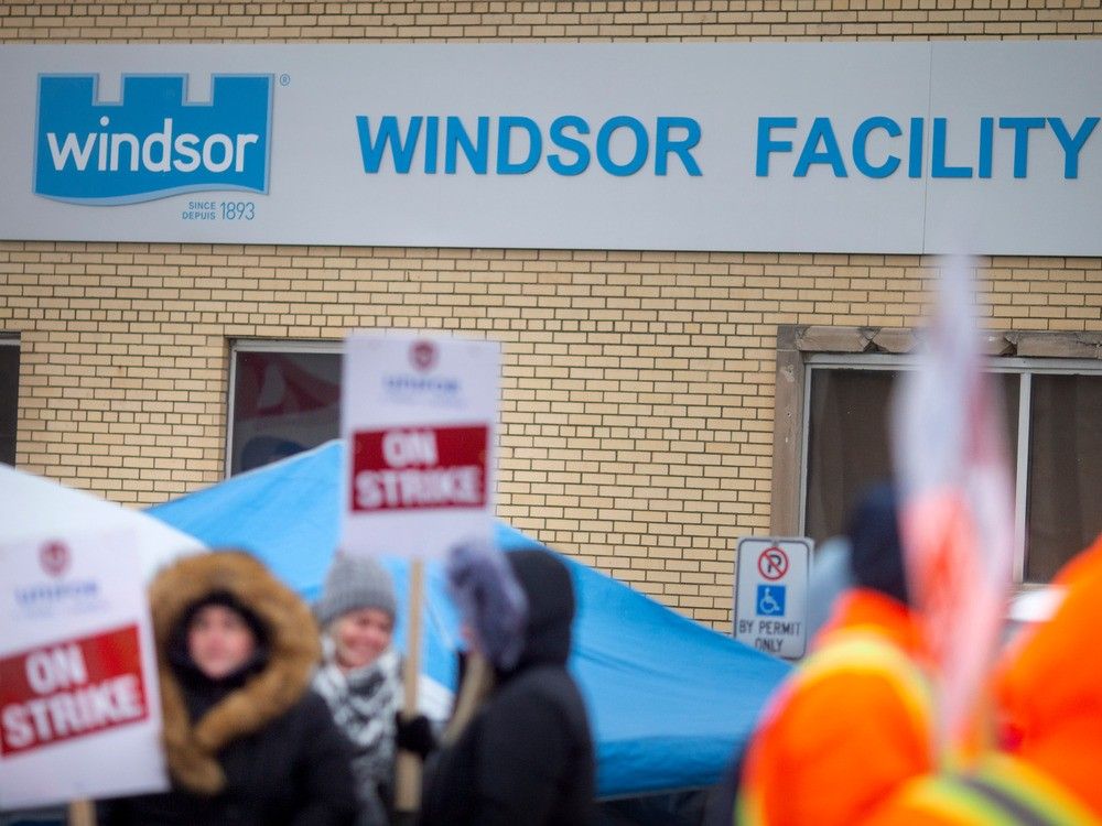 Striking workers at Windsor Salt form a picket line at the company property on Prospect Avenue on Feb. 17, 2023.