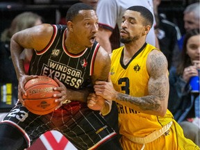 The London Lightning's Antwon Lillard tries to defence against the Windsor Express' Billy White of the Windsor Express during Sunday's game at Budweiser Gardens.
