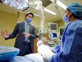 Canada's Prime Minister Justin Trudeau speaks with students at a medical training facility after meeting with Provincial and Territorial premiers to discuss healthcare in Ottawa, Ontario, Canada, February 7, 2023.