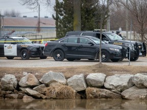 Essex County OPP vehicles attend the marina area at Cedar Island where a vehicle entered the water on Feb. 28, 2023.