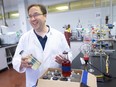 John Trant, program lead of the newly opened Wine and Spirits lab at the University of Windsor, is pictured with wine samples in the lab, on Friday, Feb. 10, 2023.