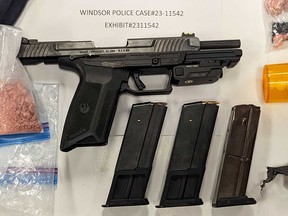 A Ruger 5.7-mm handgun with magazines and ammunition, seized by Windsor police in a raid on Feb. 8, 2023.