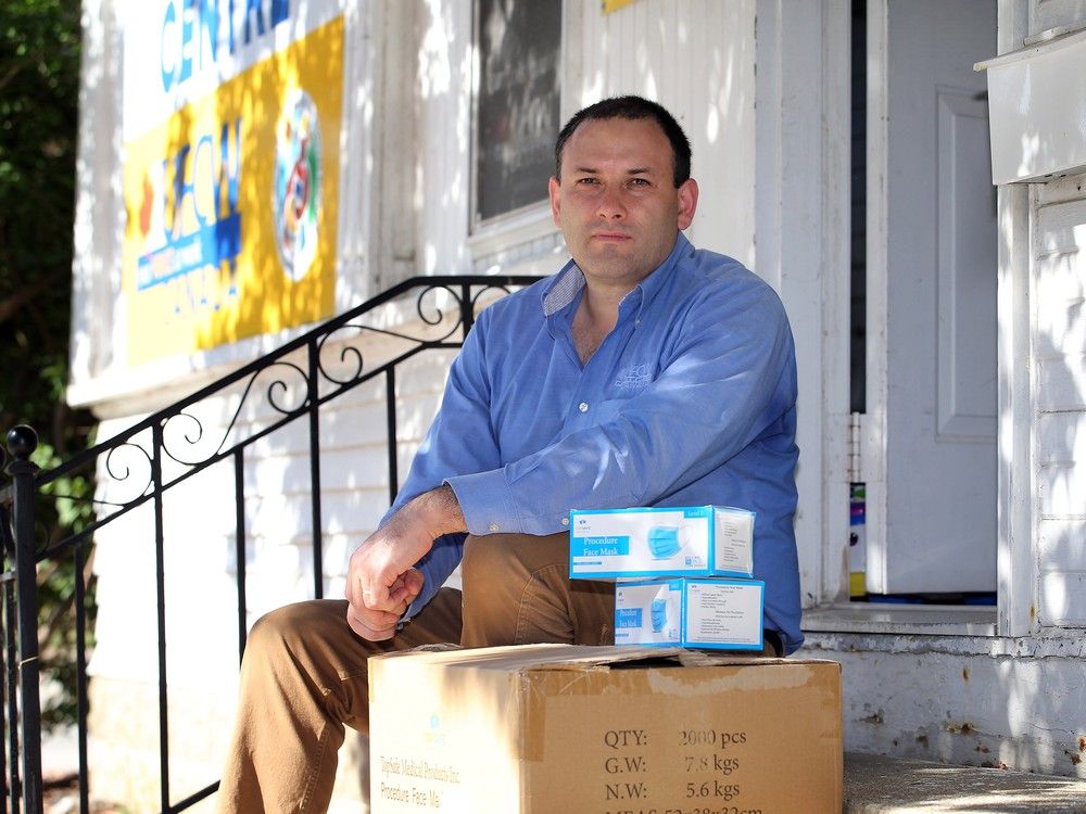 UFCW National representative Santiago Escobar prepares to hand out personal protective equipment outside the union's Agricultural Workers Support Centre in Leamington. 