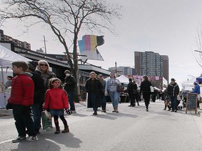 Attendees of the Downtown Windsor Farmers' Market in April 2022.
