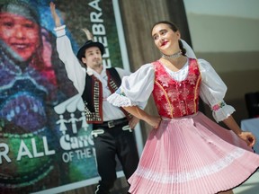 Veronica Beno and Jonathan Stano, members of the Slovak Domovina Dancers, perform traditional Slovak festival dance, during the Carrousel of the Nations media launch at Devonshire Mall, on Friday, June 10, 2022.