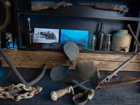 Some of the collection of items LaSalle-based expert diver Matt Zuidema has found in the Detroit River. Photographed March 22, 2023.