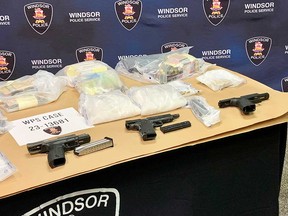 Firearms and illicit drugs seized by Windsor police in a series of raids on March 1, 2023. Photographed at Windsor police headquarters on March 3, 2023.