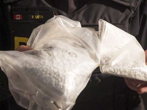 Bags of fentanyl in pill form, as shown by an OPP officer in 2017.