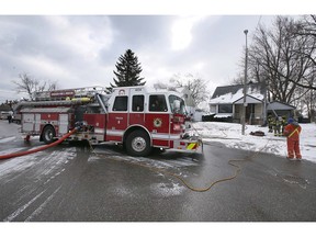 Windsor firefighters are shown at a home on Francois Court on Tuesday, March 14, 2023. A fire at the home at approximately 10:30 a.m. caused extensive damage. No injuries were reported.