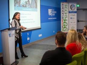 Cara Clairman, CEO of Plug’N Drive, gives the keynote address at WEtech Alliance’s Mobility Day at the Automobility and Innovation Centre, on Thursday, March 23, 2023.