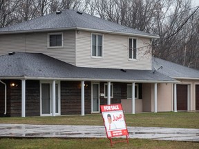 A home at 1360 Titcombe Rd., adjacent to the entrance to the Ojibway Prairie Provincial Nature Reserve, is pictured on Friday, March 31, 2023.