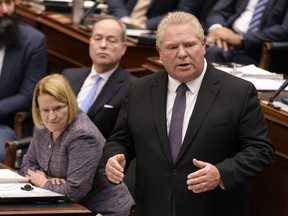 Ontario Premier Doug Ford answers a question on health care as the legislature resumes at Queen's Park in Toronto on Tuesday, Feb.21, 2023.&ampnbsp;Ontario's public health units are calling on the government to stop using one-time funding to bridge a gap it created four years ago, and to provide them with a predictable source of money as they address a backlog of services built up over the COVID-19 pandemic.