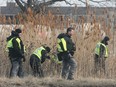 Police officers search a ditch near Central Avenue and E.C. Row on Monday, March 6, 2023. Windsor Police, OPP and Canadian Pacific Rail Police were involved in the investigation.