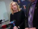 Bonnie Bednarik, who alerted Windsor police after she believed she had been contacted by a scammer claiming to be her grandson, is pictured all by a press conference on the police headquarters on Thursday, March 2, 2023.  Two males had been later arrested and charged with two counts of fraud over $5,000.
