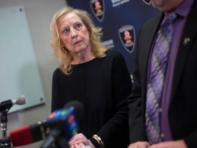 Bonnie Bednarik, who alerted Windsor police after she believed she had been contacted by a scammer claiming to be her grandson, is pictured during a press conference at the police headquarters on Thursday, March 2, 2023.  Two males were later arrested and charged with two counts of fraud over $5,000.