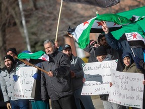 Local Syrians and supporters held a rally outside city hall on Saturday, March 18, 2023.