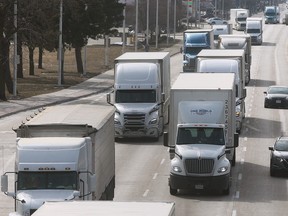 Commercial truck traffic is shown on Thursday, March 16, 2023, flowing along Huron Church Road in Windsor. A company setting up a new manufacturing facility in the Windsor area specializes in high-tech cameras, monitors and AI driver training systems for the trucking industry.