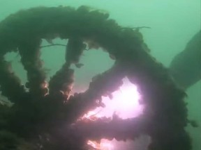LaSalle-based scuba diver Matt Zuidema's view of the wreck of a 1920s Ford Model TT truck at the bottom of the Detroit River.