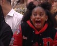 Diar DeRozan, daughter of Chicago Bulls' DeMar DeRozan, screams during a free throw session.