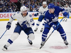 Lightning defenceman Ian Cole (28) goes to check Maple Leafs forward Mitch Marner (16) during the first period of Game One of the first round of the Stanley Cup Playoffs at Scotiabank Arena in Toronto, Tuesday, April 18, 2023.