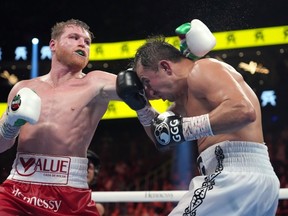 Sep 17, 2022; Las Vegas, Nevada, USA; Canelo Alvarez (red trunks) and Gennadiy Golovkin (white trunks) box during a super middleweight championship bout at T-Mobile Arena.