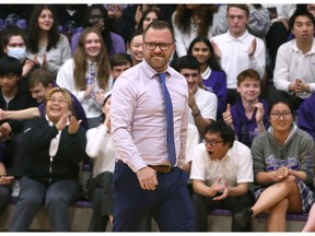 Adam Mills, a science teacher at Assumption College Catholic High School, is shown during a school assembly on Thursday, April 27, 2023. Mills received the Canadian Association of Physicists award for excellence in teaching high school/CEGEP physics.