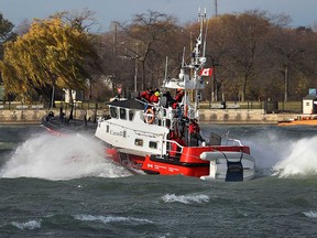 The Cape Dundas, a Canadian Coast Guard search and rescue vessel, maneuvers on the Detroit River in this November 2015 file photo.