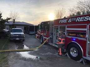 A fire truck attends a house in the 2100 block of County Road 15 near the Town of Essex on April 19, 2023.