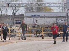 Auto workers are shown outside the Ford Essex Engine Plant in Windsor on Friday, April 14, 2023.