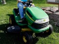 A John Deere riding mower in action in Des Moines, Iowa, in April 2020.