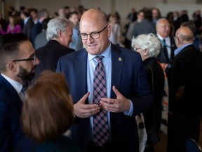 Mayor Drew Dilkens talks with guests at the Capturing the Future: Windsor?s Economic Potential; a Luncheon with Drew Dilkens, at the St. Clair Centre for the Arts, on Tuesday, April 18, 2023.