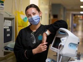 In demand. Ashley Injic, 21, a 4th year nursing student at the University of Windsor who is an undergraduate nursing employee, is pictured in the oncology department at Windsor Regional Hospital's Met campus on Monday, April 10, 2023.