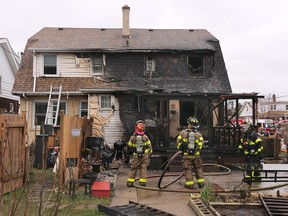Windsor firefighters are shown at a house fire on Saturday, April 1, 2023 in the 900 block of Parent Avenue.