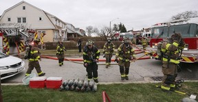 Windsor firefighters work at the scene of a house fire on Saturday, April 1, 2023 in the 900 block of Parent Avenue.