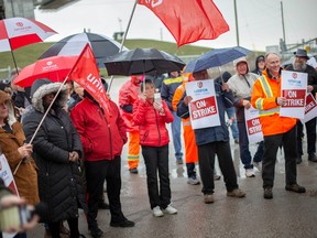 Striking employees of Windsor Salt, along with supporters, hold a rally on the picket line, on Monday, April 3, 2023.