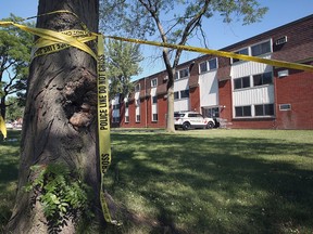 Windsor police used tape to block off a large area outside an apartment building in the 2600 block of Sycamore Drive on June 16, 2021, following a late-night fatal stabbing the night before.