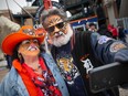 Hear the roar. Longtime Tigers fans, Pam and Tony Rinna, from Southgate, Mich., take a selfie outside Comerica Park on opening home day of the 2023 Detroit Tigers season in Detroit on Thursday, April 6, 2023.