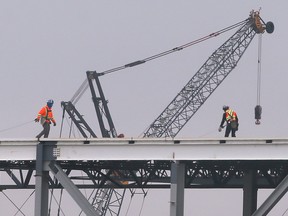 Workers are shown at the NextStar Energy Inc. battery plant construction site in Windsor on Thursday, March 2, 2023.