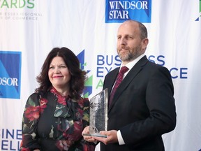 St. Clair College President Patti France presented the Company of the Year (over 25 employees} to Ken Kapusniak, President of consulting engineering firm HGS Limited on Wednesday, May 17, 2023 at the Windsor-Essex Regional Chamber of Commerce 2023 Business Excellence Awards.